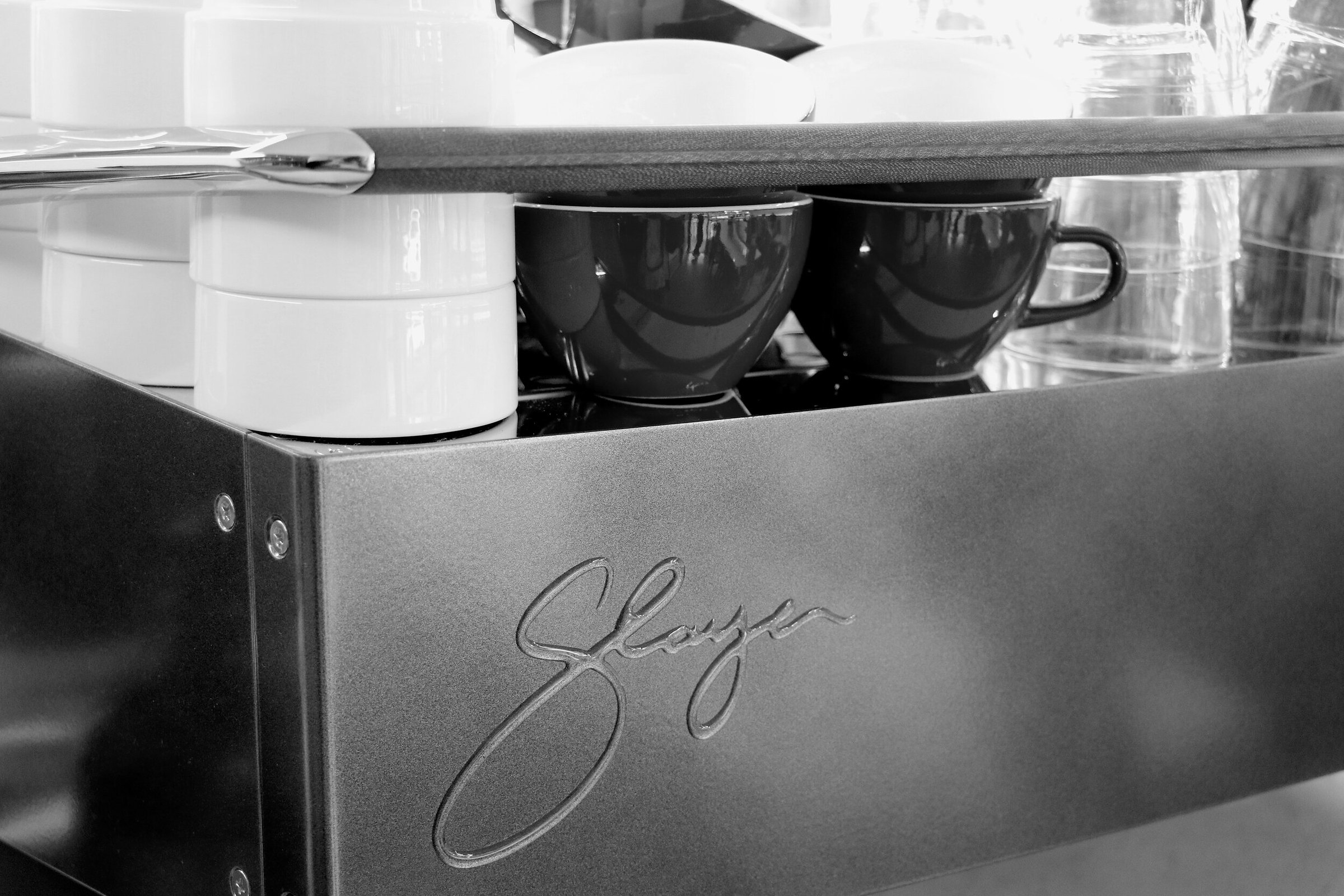 Cups warming on top of our espresso machine